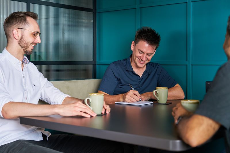 Staff members in a meeting.