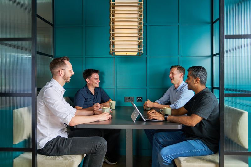 Staff members in a meeting.